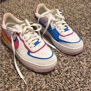 Nike Low-Top Colorblock Sneakers in White, Pink, Blue & Yellow